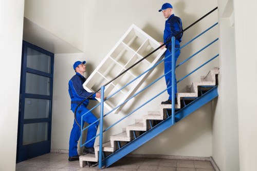 Removal team planning a move in a Maida Vale street