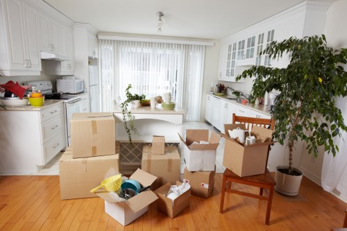 Packed office equipment ready for transport during a local relocation