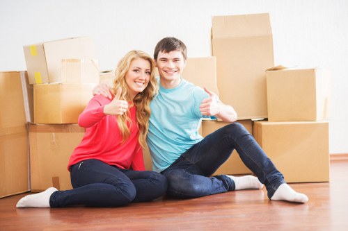 Packed boxes and moving van for a flat removal in Maida Vale