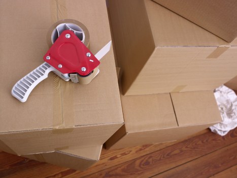 Packed moving boxes ready for removal truck hire