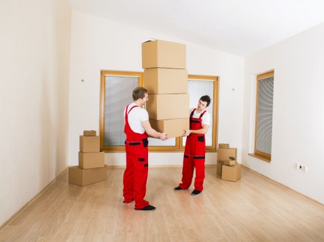 Packed boxes and moving supplies ready for house removals