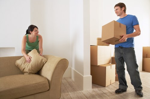Unpacking boxes in a Maida Vale flat after moving day