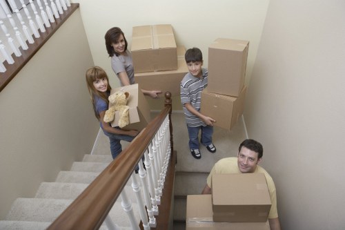 Loading boxes and furniture into a removal truck
